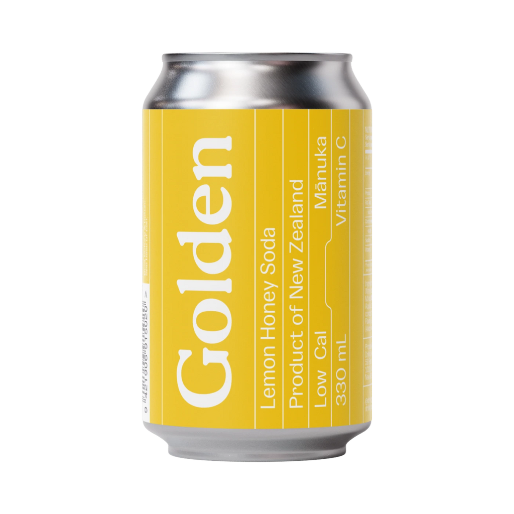 Yellow can of Golden Lemon Honey Soda with silver top and bottom on a white background